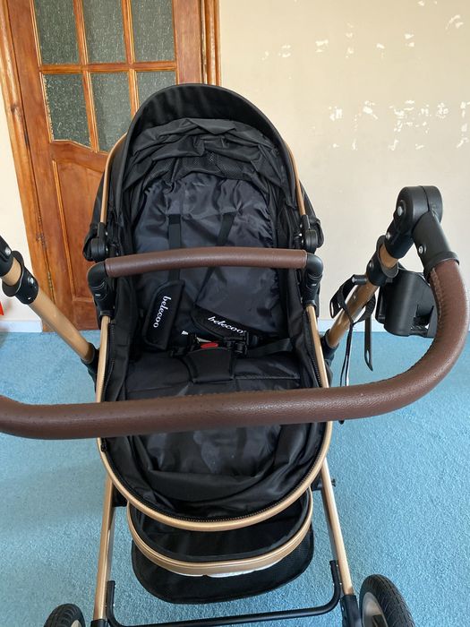 Продам коляску белеку черная