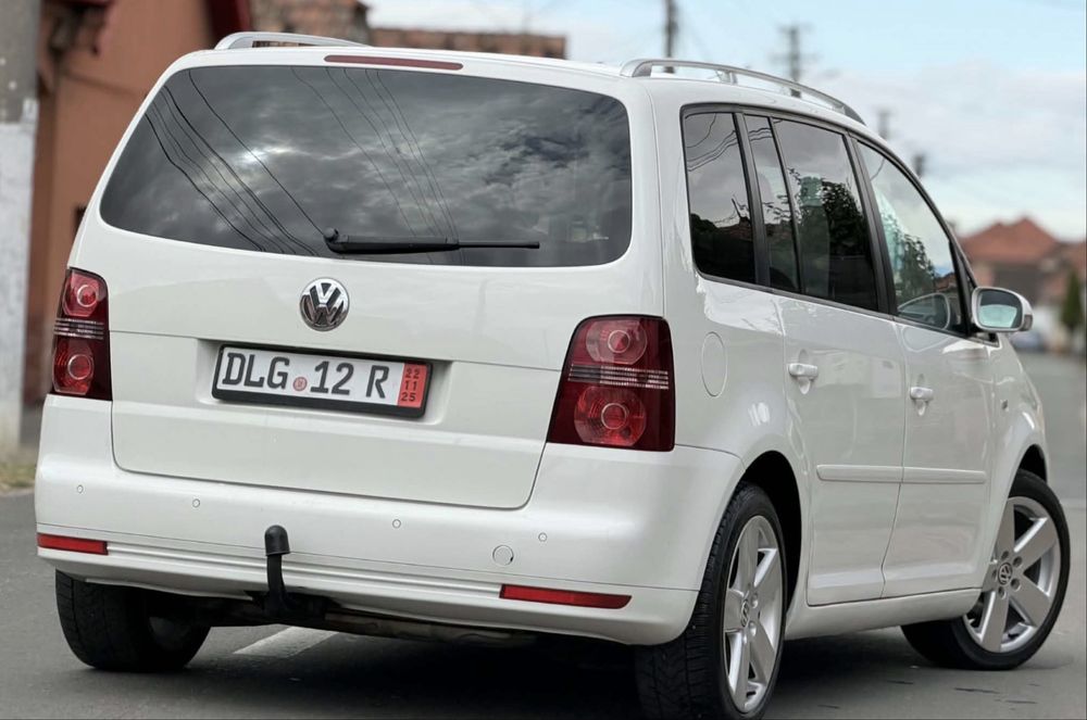 VW Touran 2009 7 locuri model rline 2.0 cu un ax