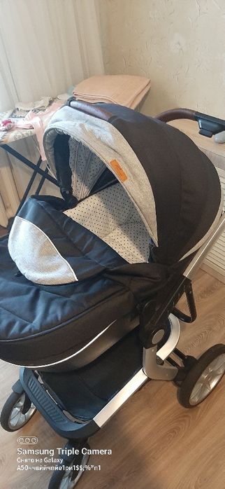 Продам коляску и стульчик