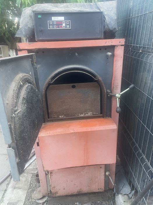 Vand centrala pe lemne