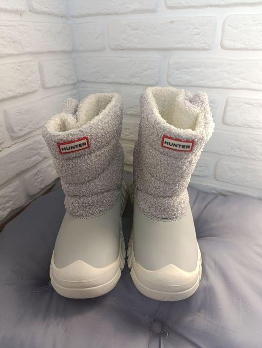 Продам новые сапоги.