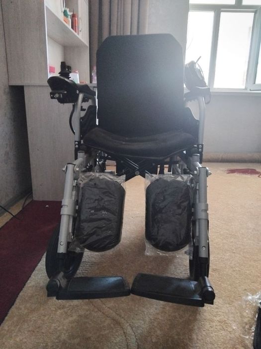 Электрическая инвалидная коляска