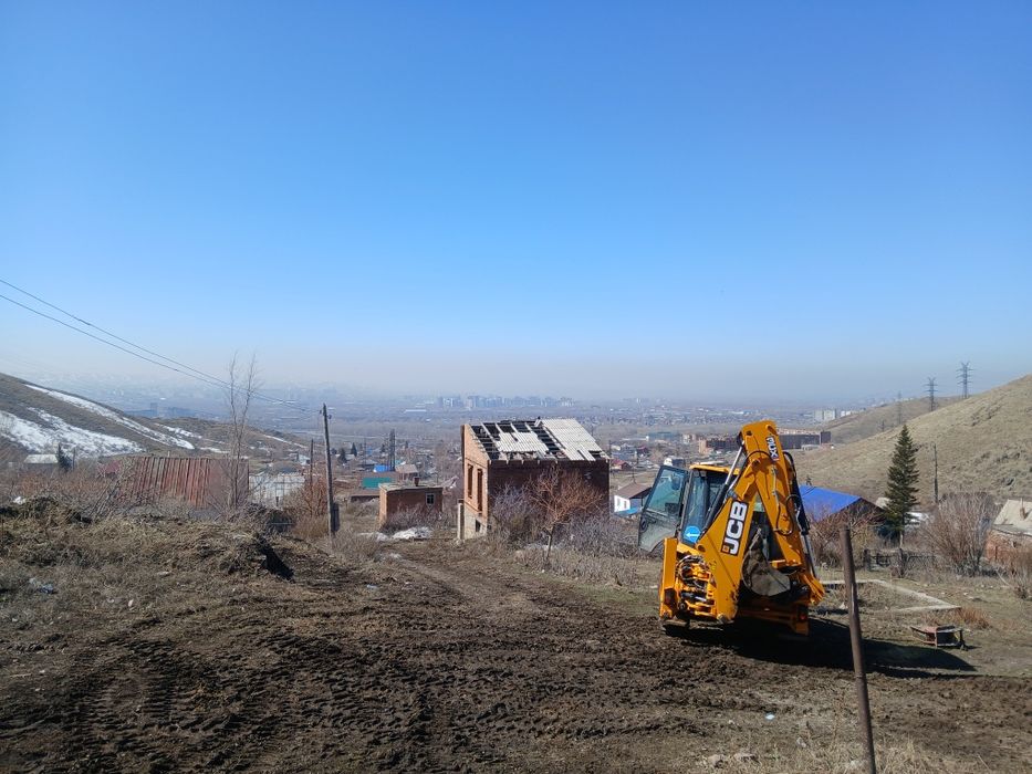 Услуги экскаватора погрузчика