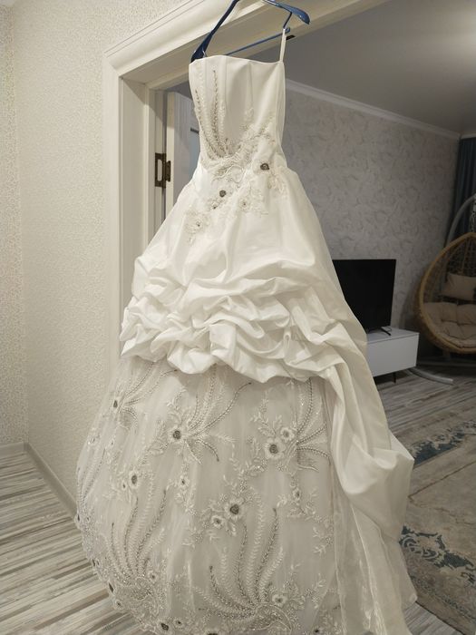 Свадебное платье привезено из Европы