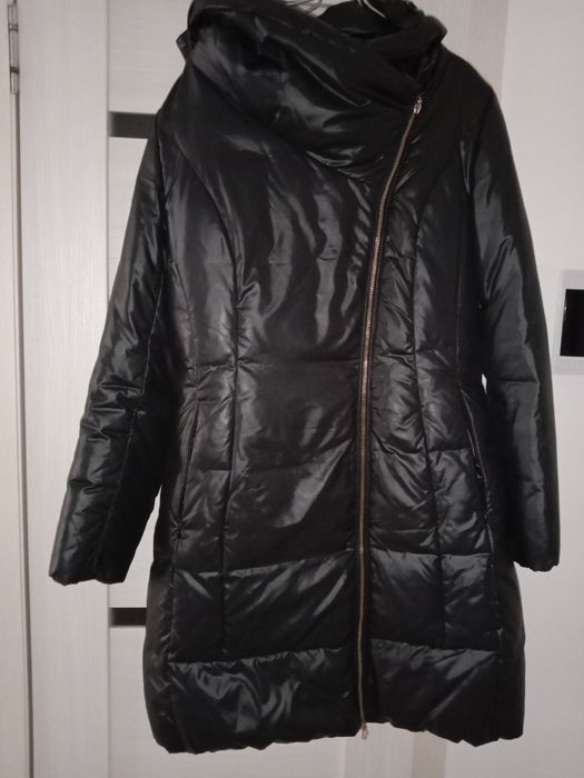 Продам пуховик демисезонный.