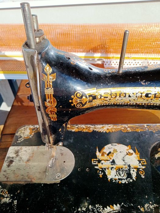 Mașină de cusut Singer