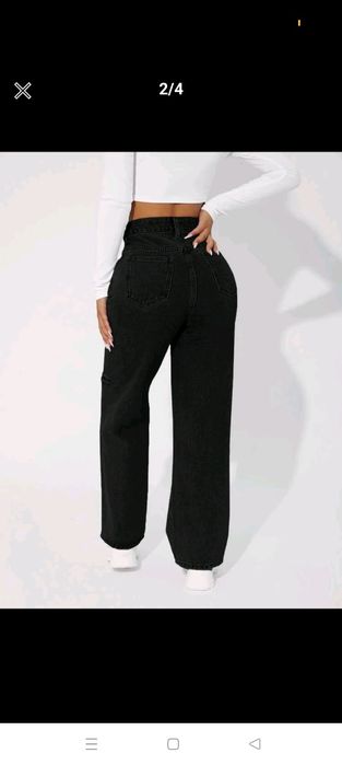 Vând blugi rupți negri