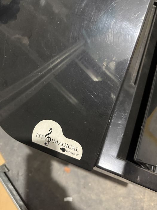 Pian conservatory grand piano