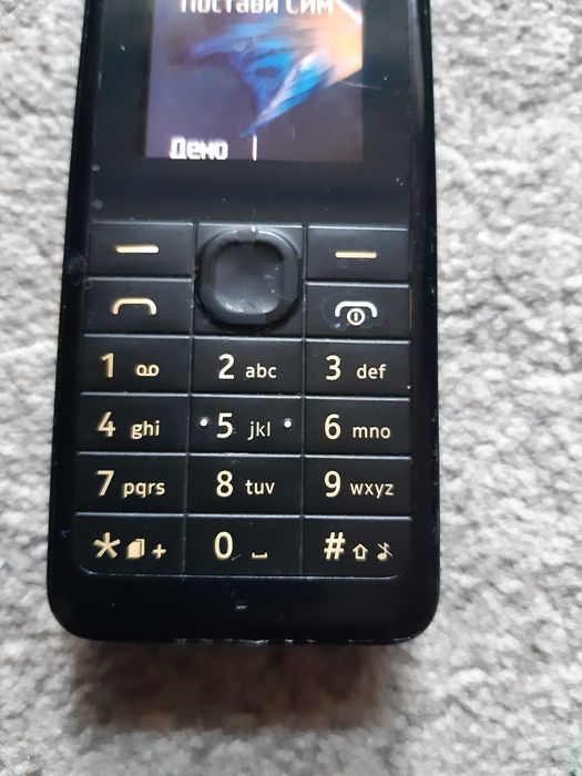 Мобилен телефон NOKIA 107, със зарядно у-во и слушалки