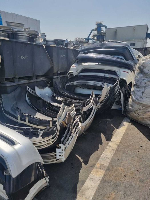 Передний бампер  оригинальный ассортимент