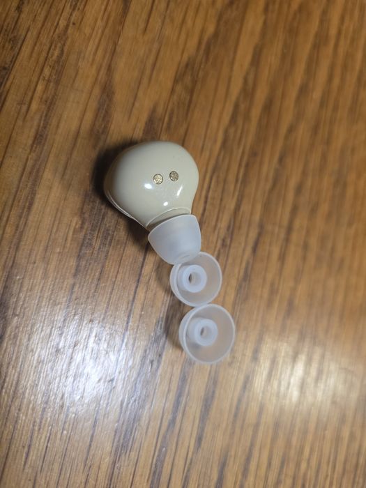 Cască auditivă wireless + dock încărcare | discretă, ușor de folosit