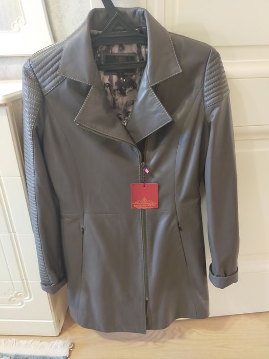 Плащь женский новый, кожанный