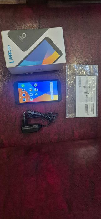 Телефон Alcatel one