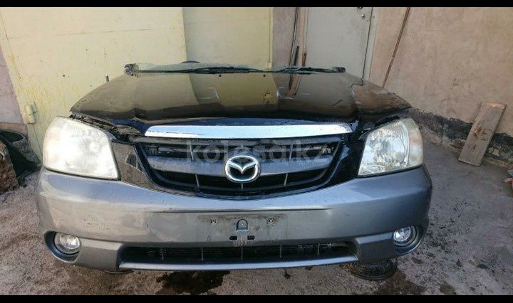 Запчасти Мазда Трибут