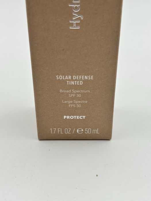 тониран слънцезащитен крем с широк спектър SPF 30 HydroPeptide Solar