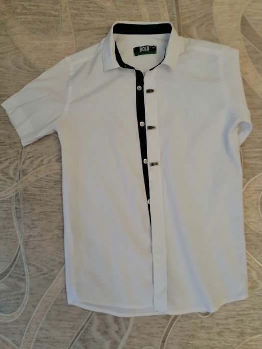 Продам школьную одежду