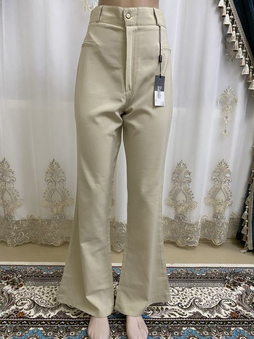 Bryuk yangi kiyilmagan, itiketkasi bor, брюки новые