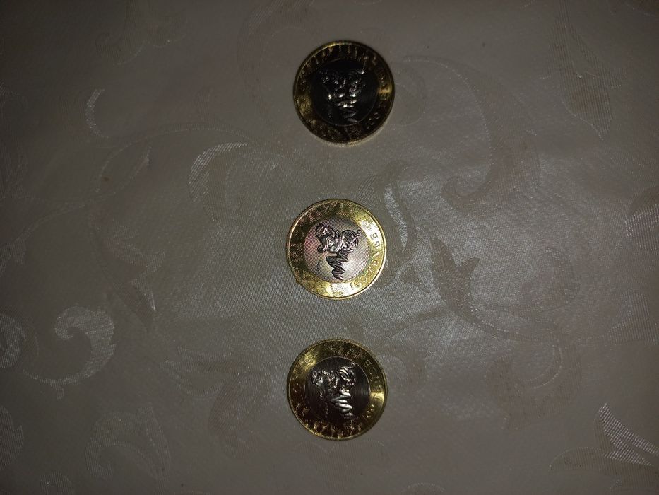 Продам коллекционные монеты 100 тг