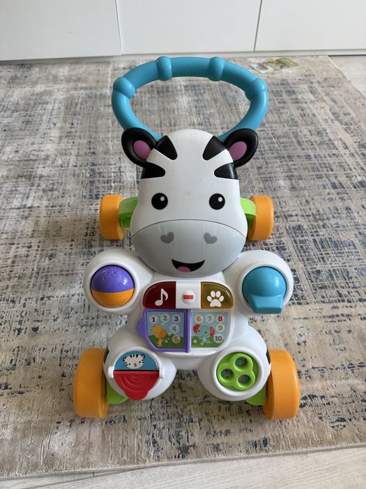 Fisher Price - premergator zebra cu sunete si lumini