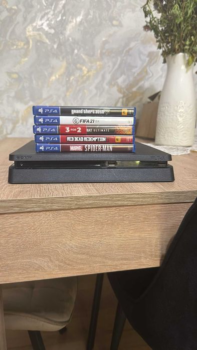 PlayStation 4 Slim 500 GB + 5 Jocuri + 2 Controller + statie de incarcare Controller