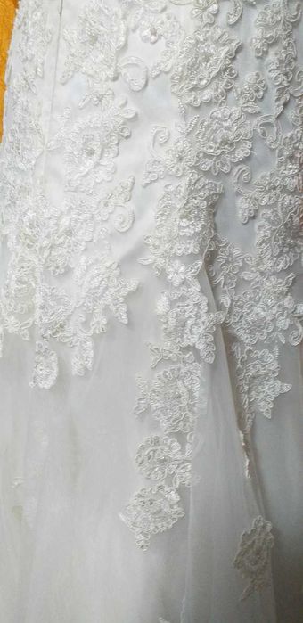 Сватбена рокля от колекцията на модна къща "Романтика"