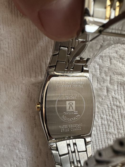 Часы швейцарский марки Romanson