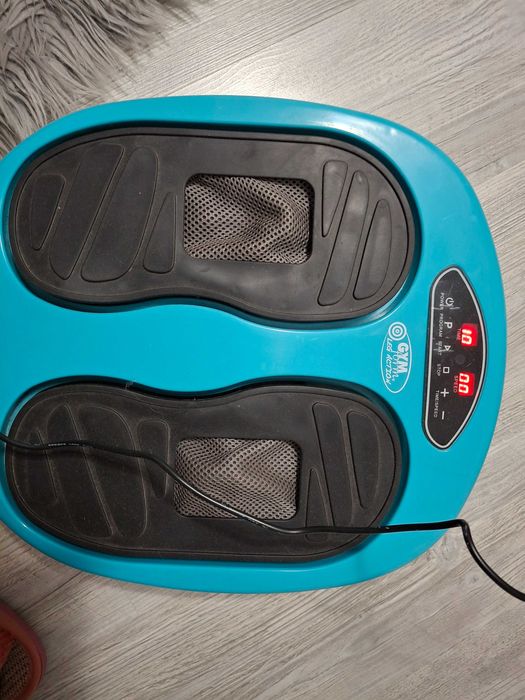 Aparat de masaj pentru picioare cu vibratii