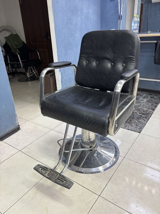 Парикмахерская кресло
