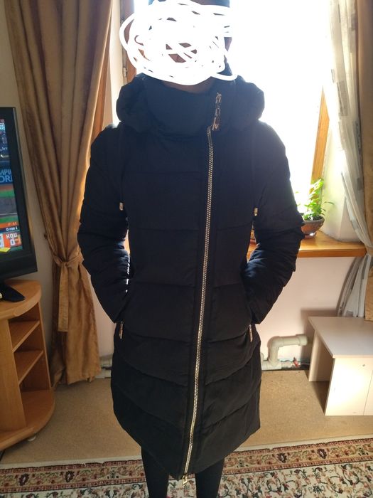 Продам пуховик женский.