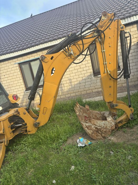 Экскаватор погрузчик 3в 1