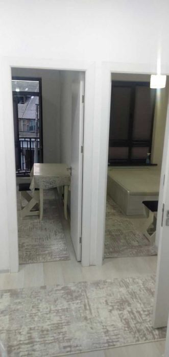 In the Yashnabad district, a two-room apartment is for rent.