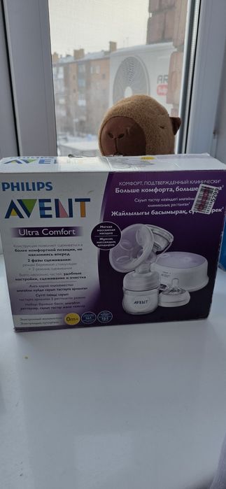 Электрический молокоотсос