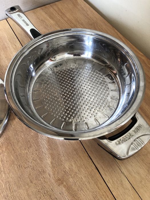 Тиган от неръждаема стомана със слоесто дъно, Англия