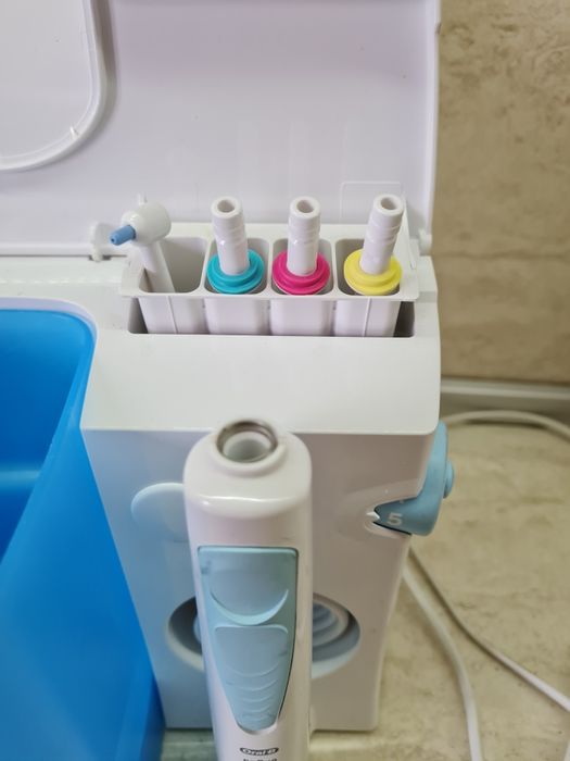 Braun water jet система за почистване на зъби