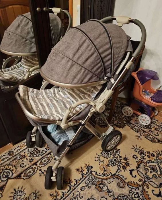 Продам серую коляску