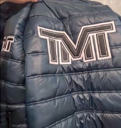 Безрукавка TMT.