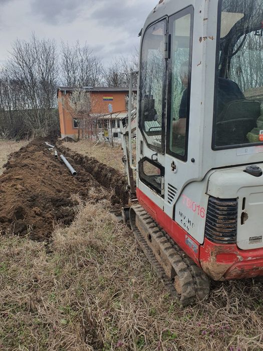 Buldoexcavator excavator bobcat fose septice