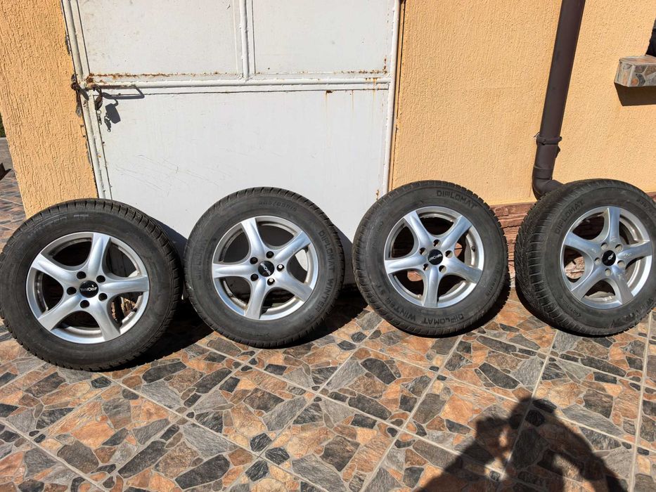 Комплект джанти с гуми 15си