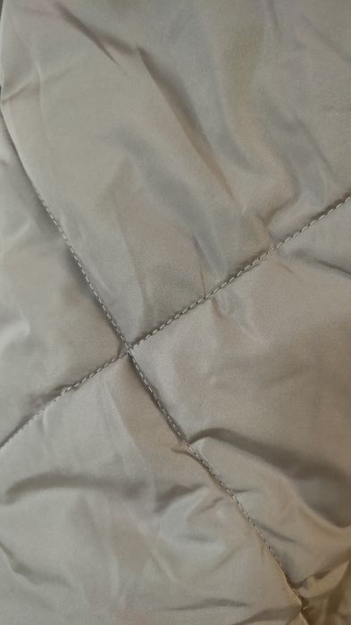 Продам пуховик новый