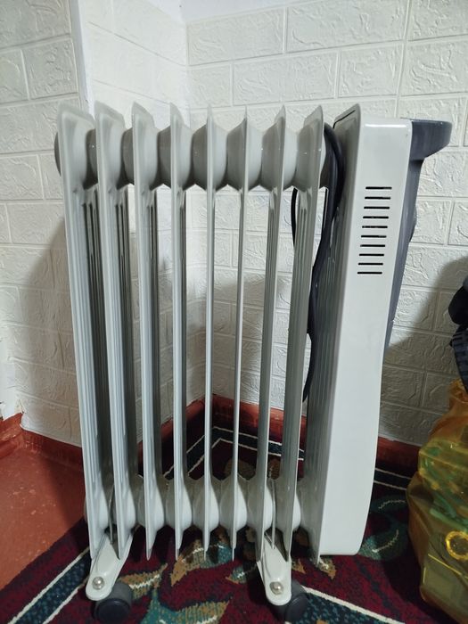 Маслянный обогреватель