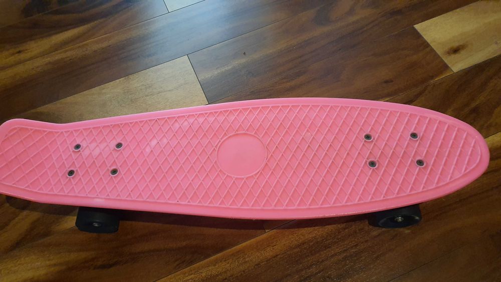 Skateboard roz 68 x 20 cm material ABS rulmenti ABEC 7 sasiu aluminiu