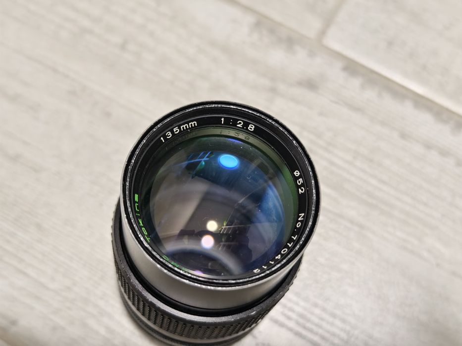 Obiectiv Tokina 135 2.8  montura canon C/FD