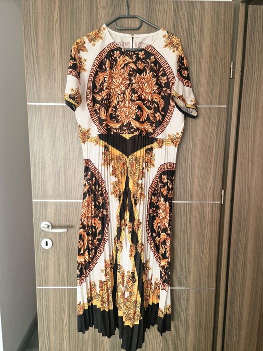 Rochie plisata vaporoasa