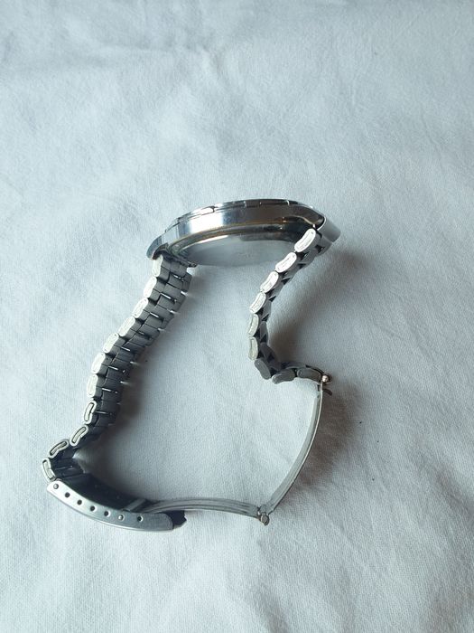 Полет - руски механичен часовник, с ръчно навиване.