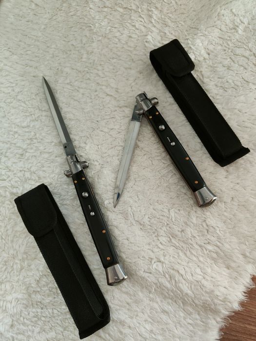 Briceag italian cu buton automat , mâner negru 34cm lungime totala