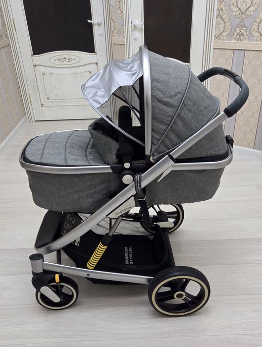 Коляска Una-Baby