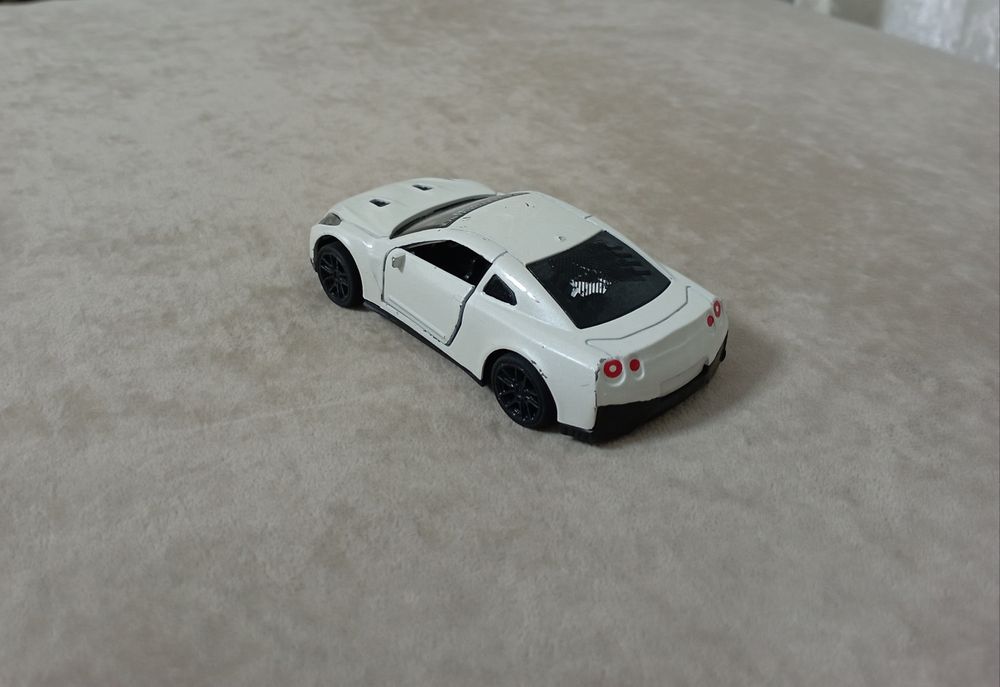 Железная машинка Nissan gtr am3 sport игрушка.