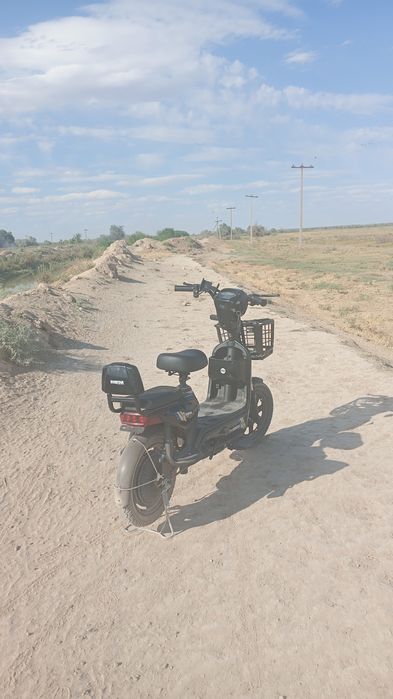 Скутер на тараза