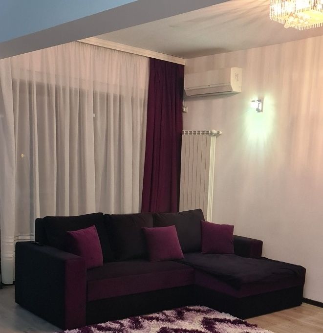 Canapea extensibila cu perne incluse