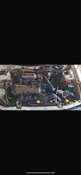 Машина Mazda 323